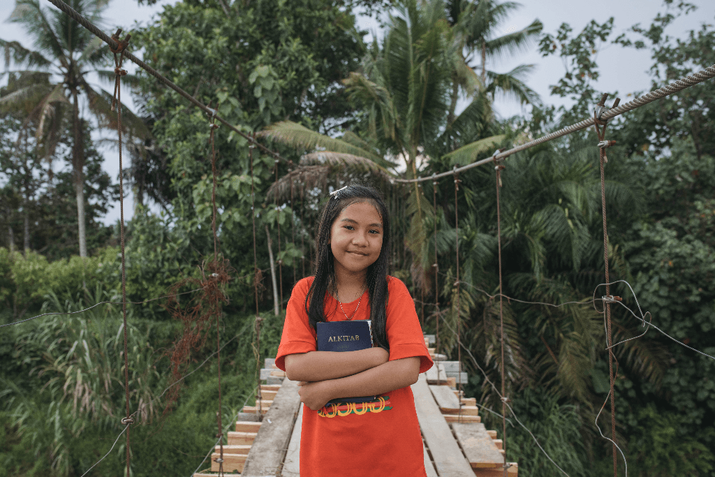 An answered prayer! Tivani and her Bible.