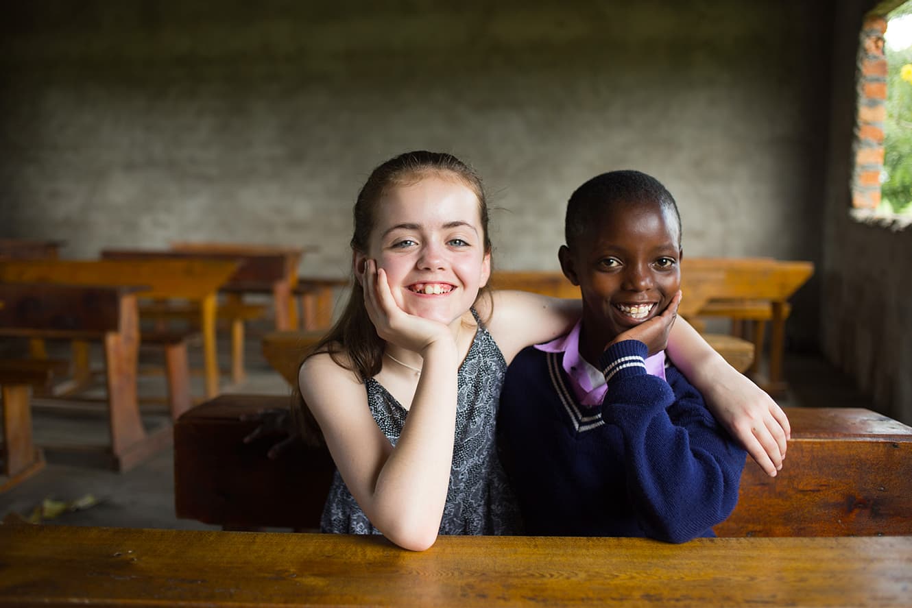 Emilie and Ana in classroom in Tanzania
