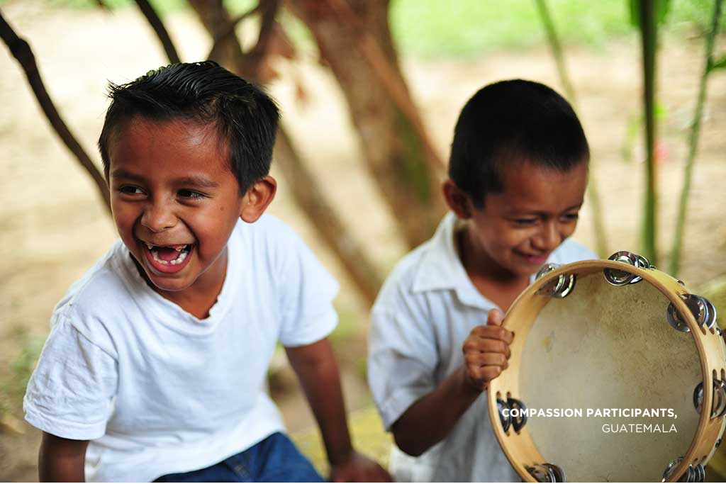 Compassion participants enjoy a musical break in Guatemala