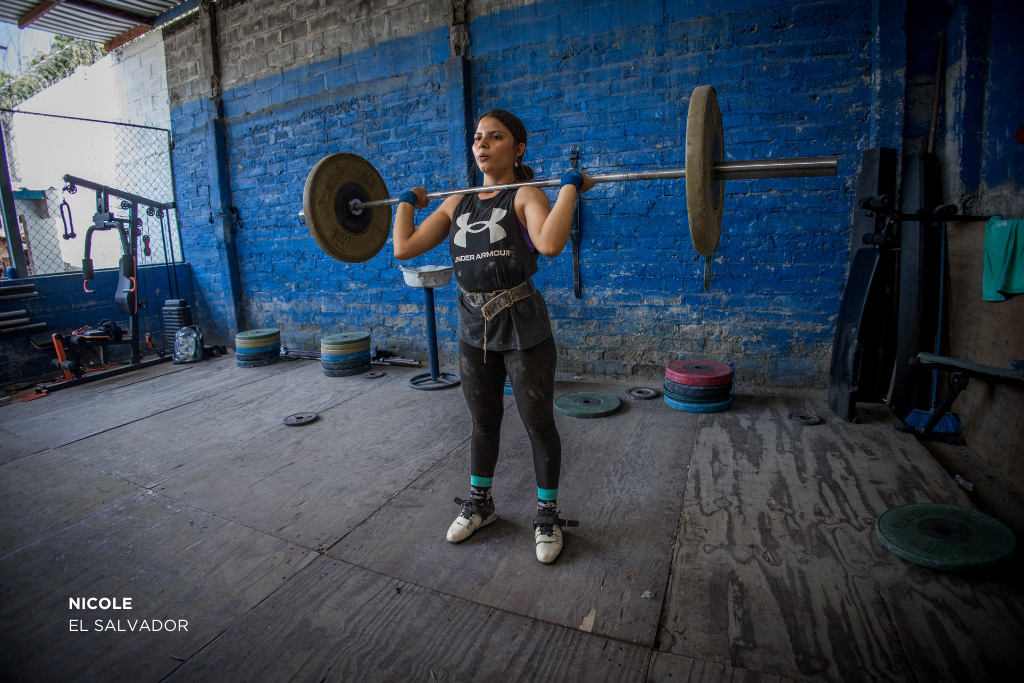 Nicole is training to compete in the regional weightlifting championship