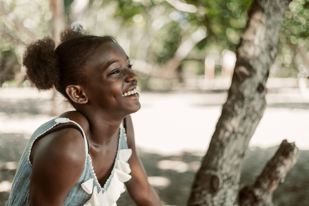 Lauri, 13, from the Dominican Republic smiling