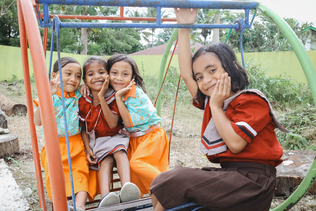 Virginia and her friends at school in Indonesia